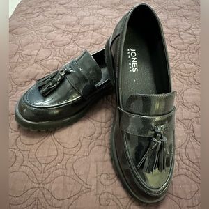 Jones New York platform loafers with tassel detail.
